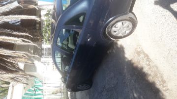 CORSA 2009      1.8  CD